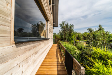 Thermory Kodiak thermo-spruce C15 cladding and Benchmark thermo-pine D4 decking, Private house in Hungary, Arhitect Attila Bogdan