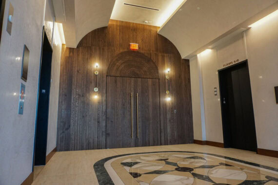 Thompson Hotel Doors, Thermory thermo-ash door cladding, Architect HOK, Photographer Emily Hemenway