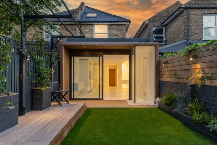 modern wood extension to a brick house in London