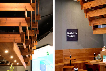 Close-up of Thermory thermo-spruce ceiling structure and wall detail in Ramen Taro, showcasing craftsmanship, balance and natural wood texture.