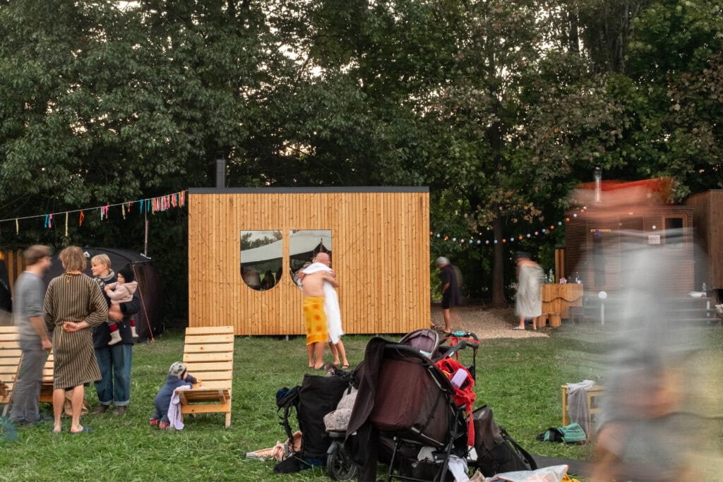 Sauna NUUK in Hradec Králové with Thermory thermo-spruce cladding and alder interior, designed and co-built during a community workshop in 2025